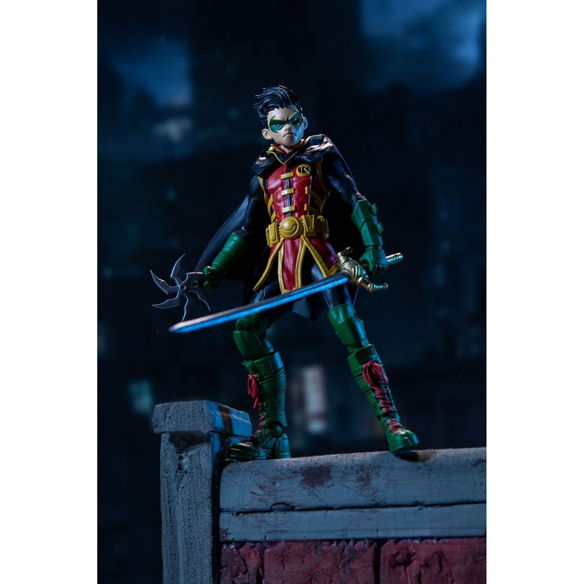 DC Multiverse Damian Wayne Robin 7-Inch Action Figure With city background